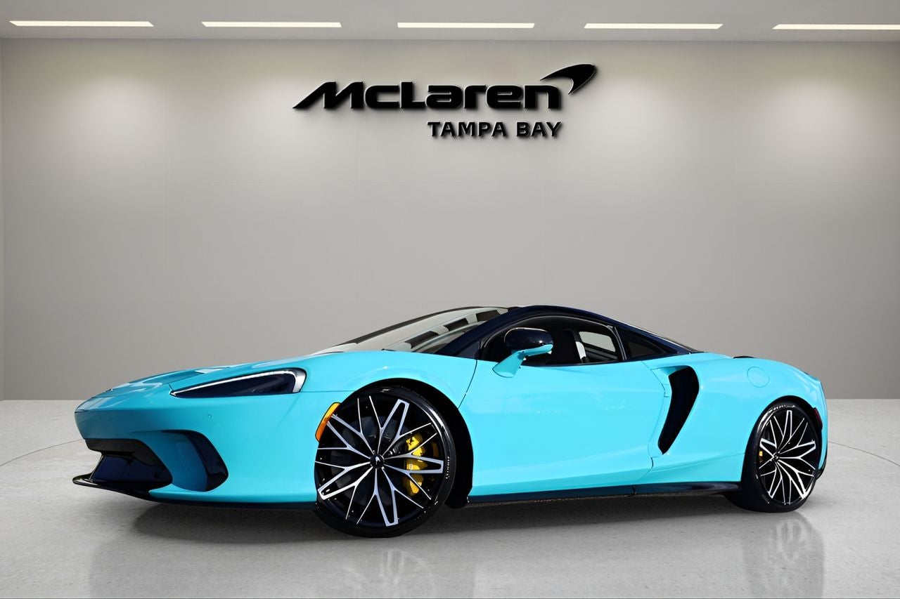 2026 McLaren GTS Base in Tokyo Cyan — front three-quarter view
